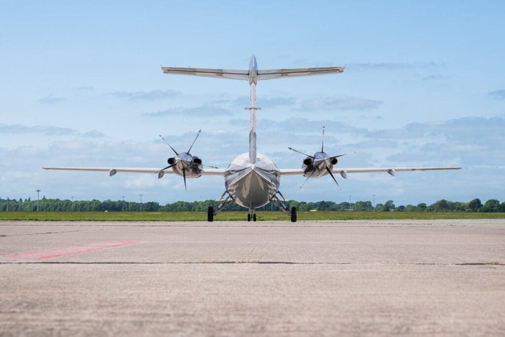Rear view of a Piaggio Avanti EVO aircraft on the tarmac.