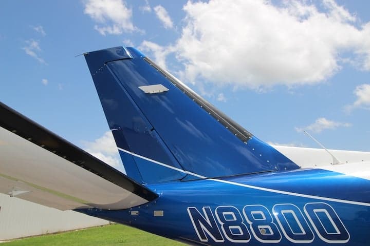 Close-up of the aircraft's tail with the tail number N8800.
