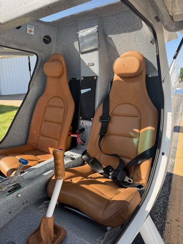 The interior of the CTLSW aircraft features two tan leather seats.