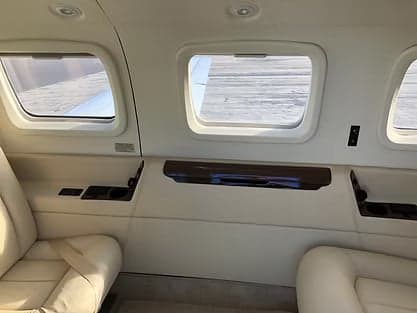 View of the entry steps and interior of the Piper M600 aircraft.