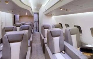 A view of the aircraft's interior, featuring leather seats.