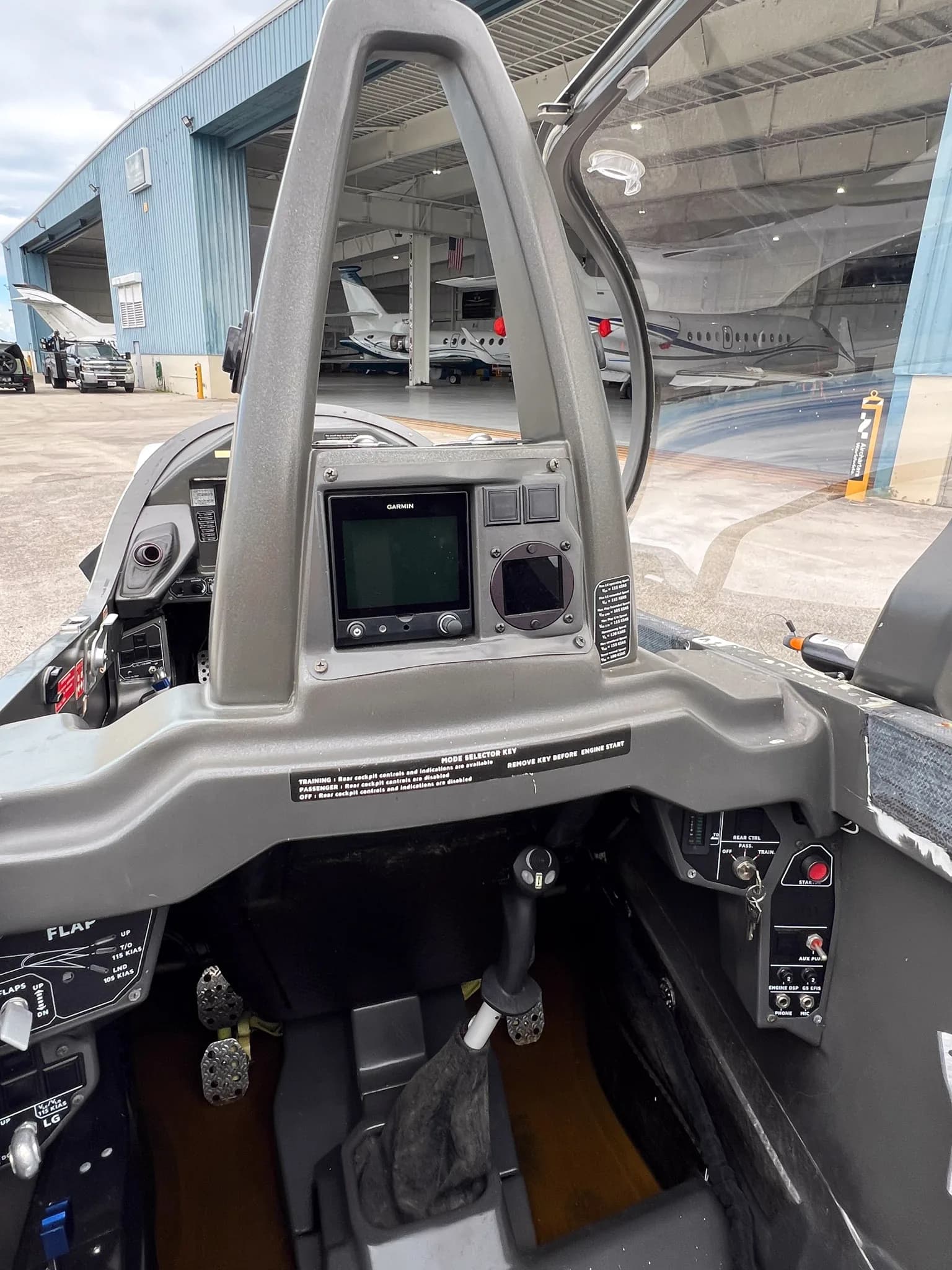 View of the cockpit instrument panel and seats of the Blackshape Gabriel aircraft.