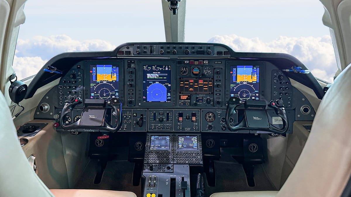 Aircraft cockpit with modern avionics and the registration SP-VHA.