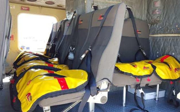 Instrument panel and cockpit seating of a helicopter.