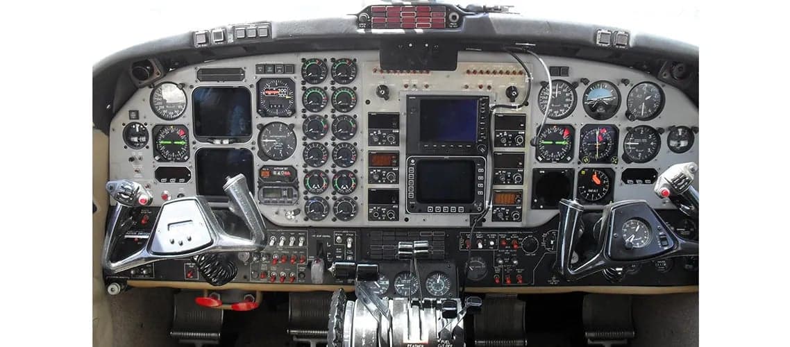 Detailed view of the aircraft's instrument panel with various gauges and controls.