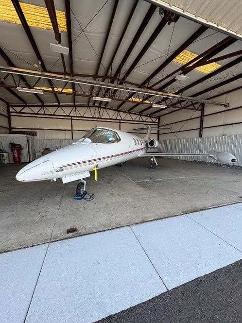 A Learjet 35A in a hangar.