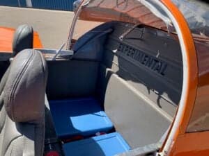 View of the interior with seats and storage area.