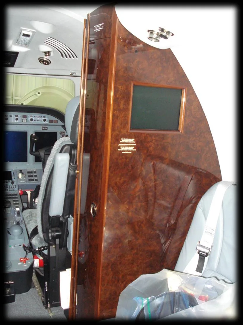 View of the cabin divider and cockpit of the aircraft.