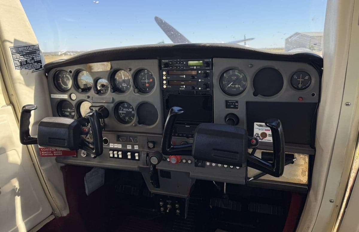 The instrument panel of the Cessna 152 II aircraft.