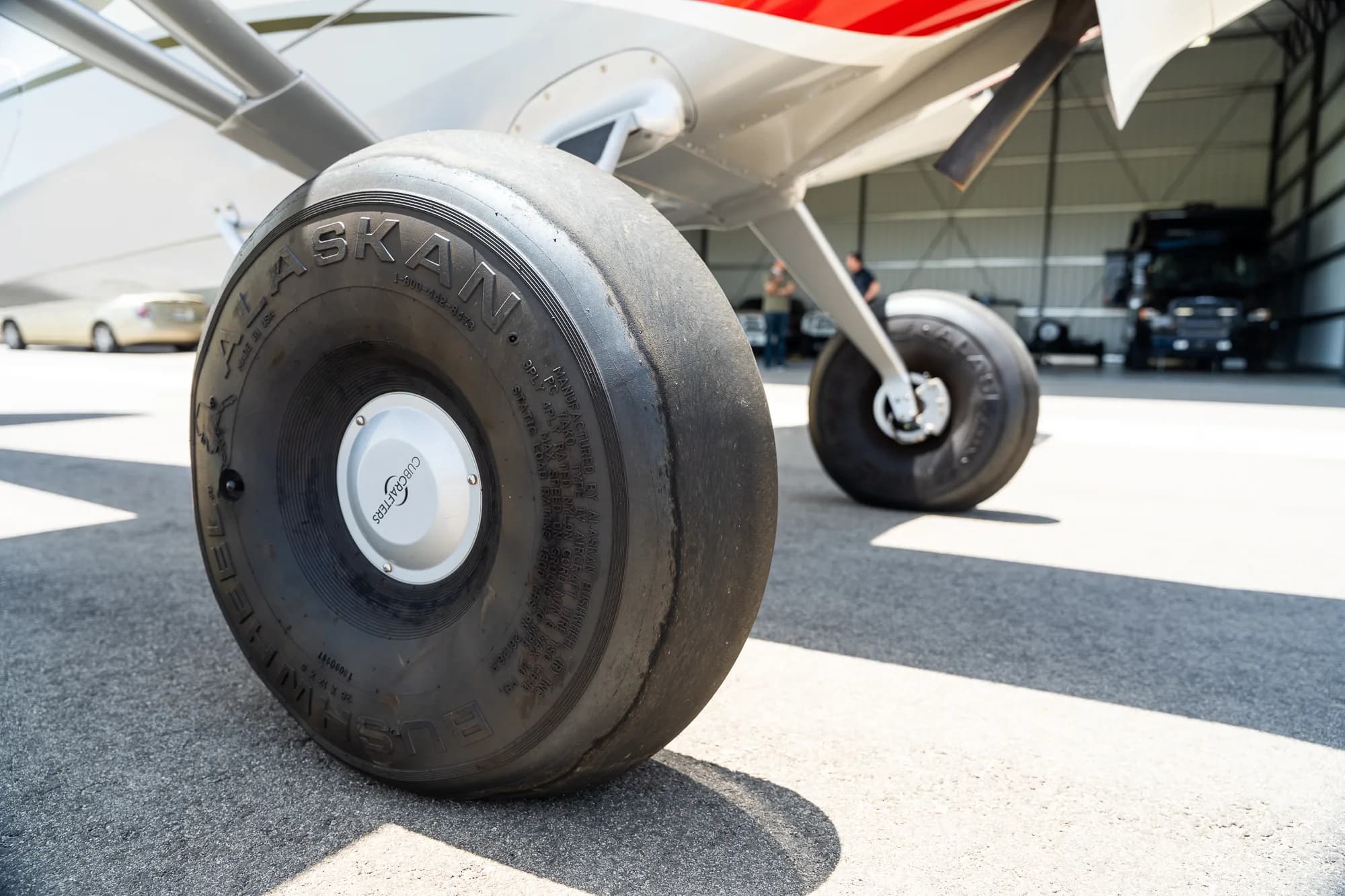 Close up of the large Alaskan tires on a CubCrafters XCub aircraft.
