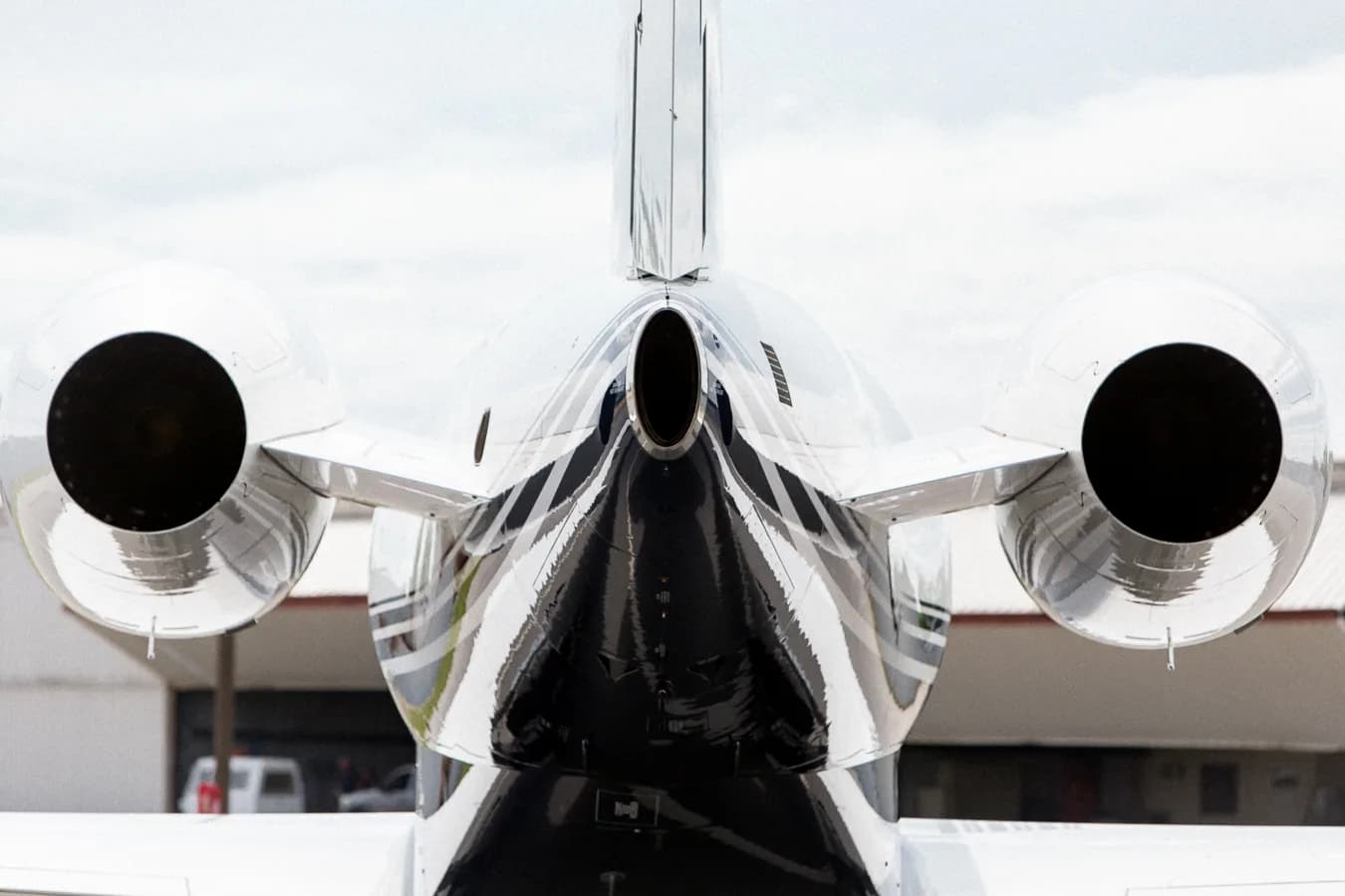 Close-up of the rear of the aircraft showing the tail and engines.