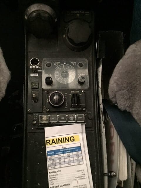 A close-up of the cockpit controls and instruments.