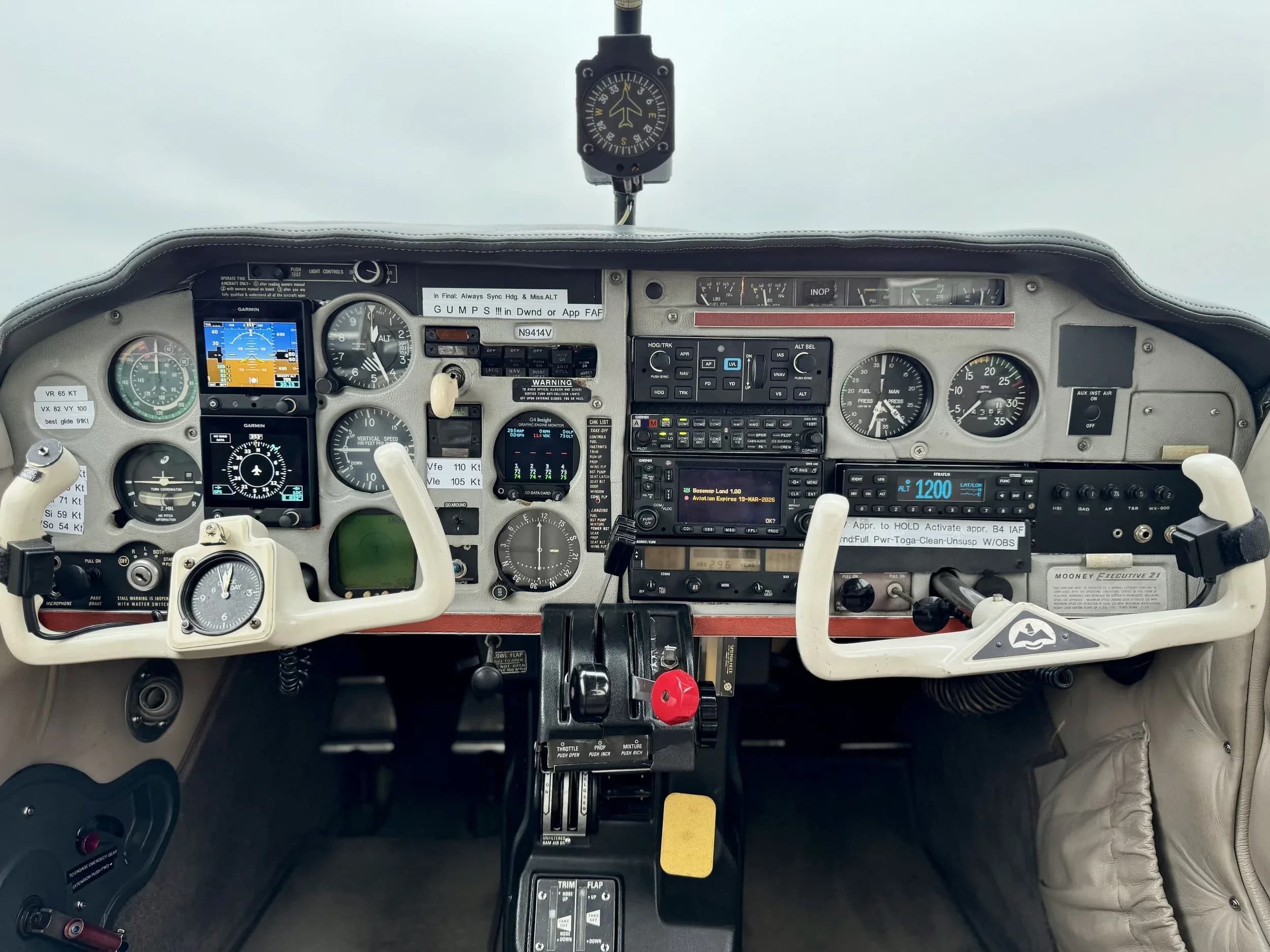 The cockpit of the aircraft features a full instrument panel and control yokes.