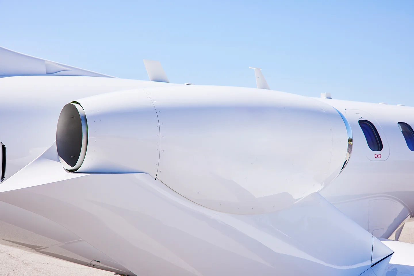 Close up of the engine of a white HondaJet.