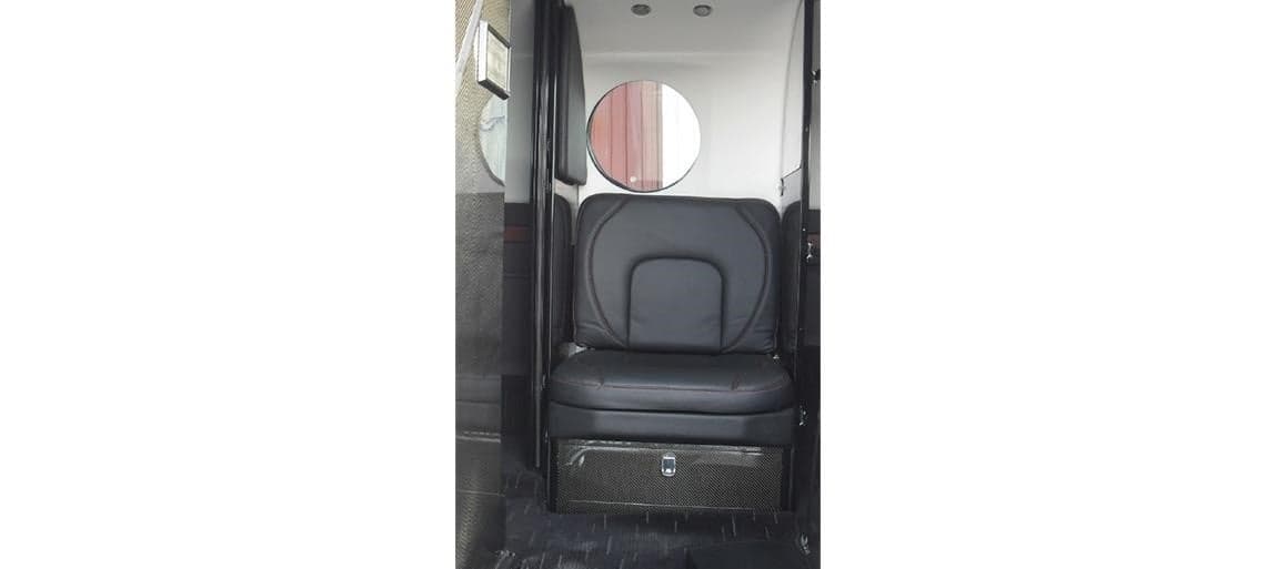 A single seat in the Beechcraft King Air 350's cabin.