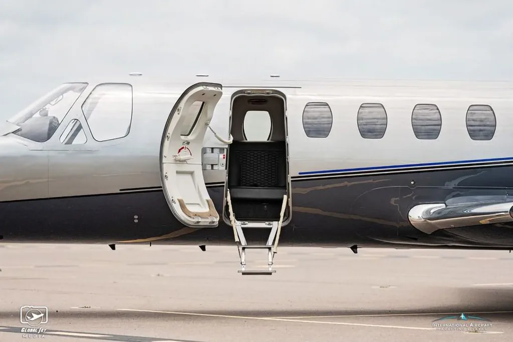 The open entry door and airstairs of the N15JT Cessna Citation X business jet.