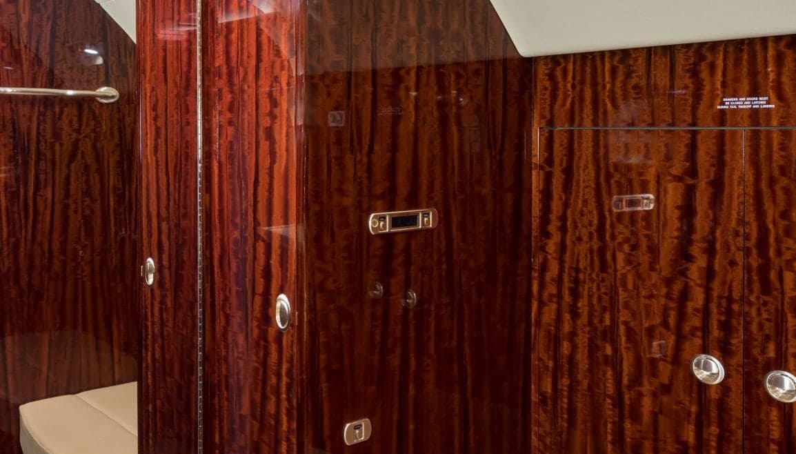 A close-up of the aircraft's interior, showing the wood paneling and fixtures.