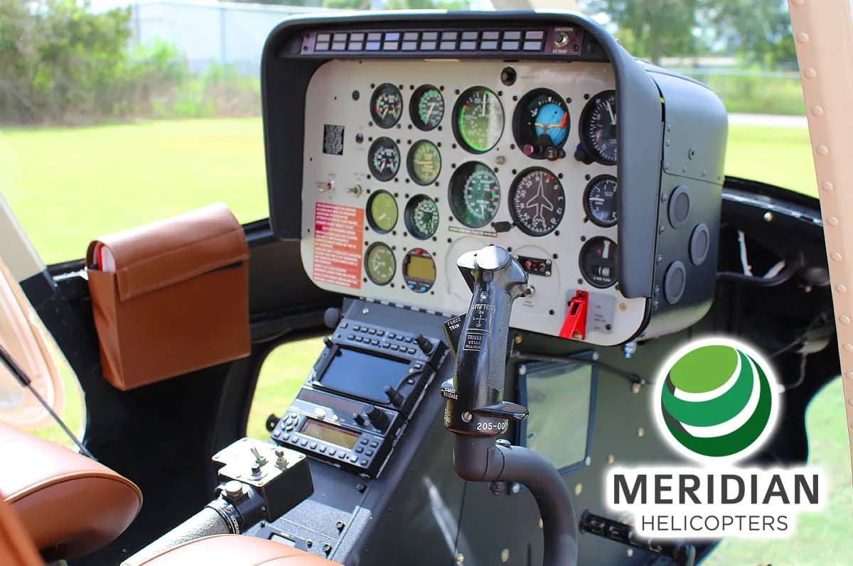 Close-up of the helicopter's instrument panel and controls.