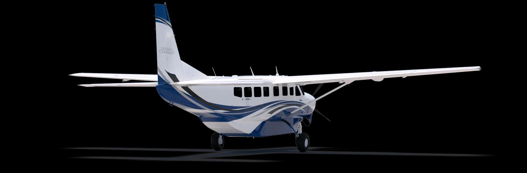Stock photo of a Cessna Grand Caravan with blue and white paint scheme, rear quarter view.