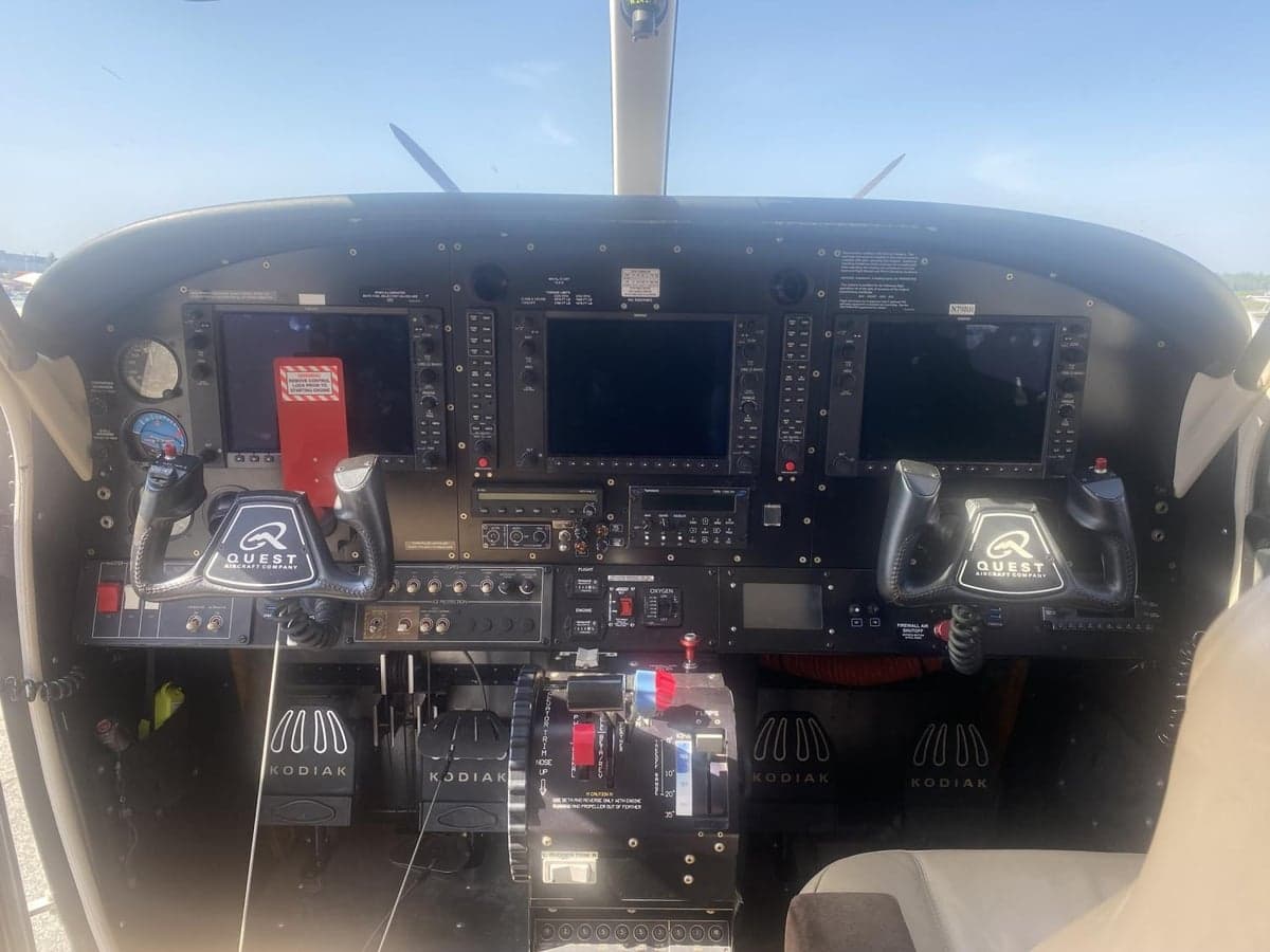 The cockpit of a Quest Kodiak aircraft features a modern instrument panel.