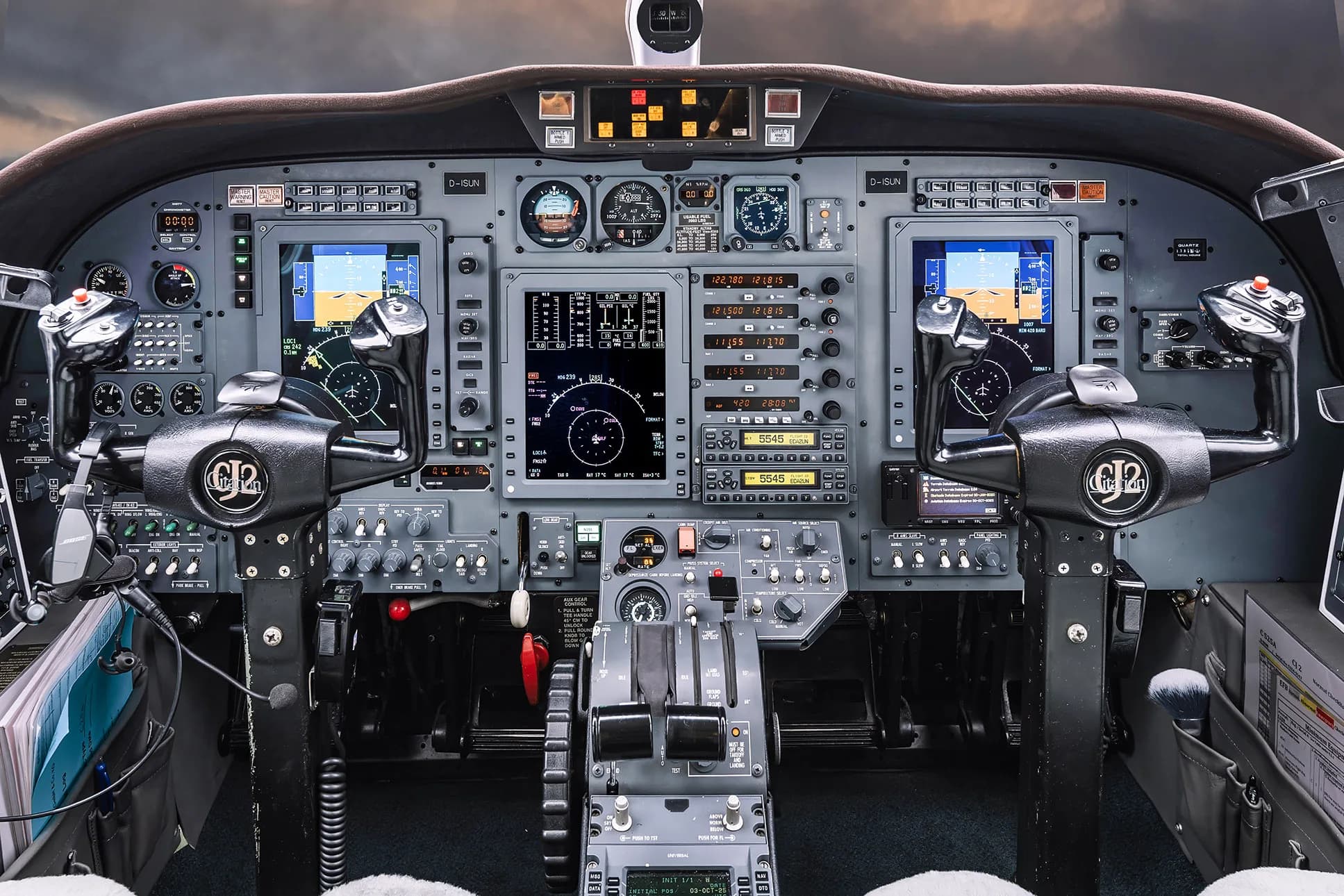 Full view of the cockpit instrument panel of a Cessna Citation CJ2 aircraft.
