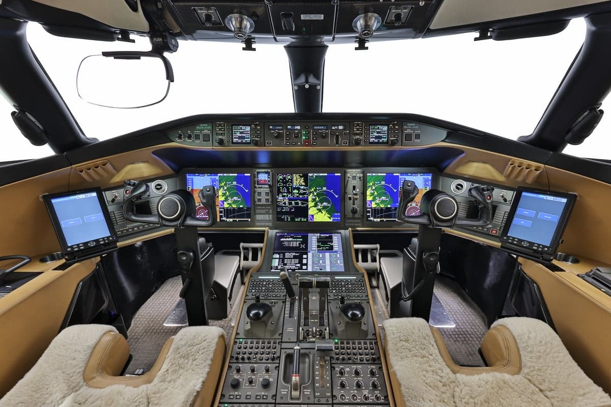 Detailed view of the Bombardier Global Express cockpit instrument panel.
