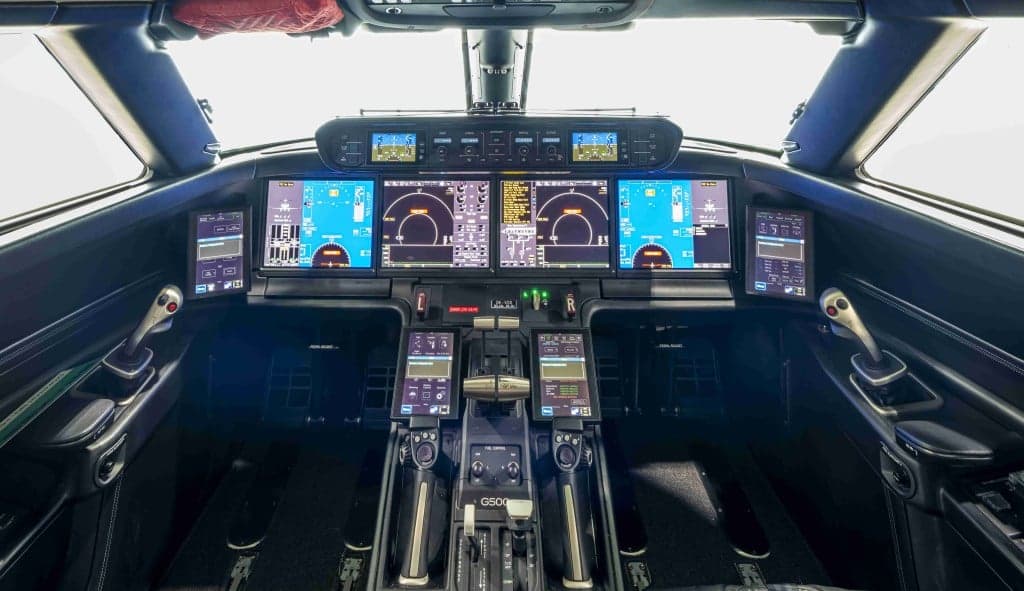 A view of the aircraft's galley and cockpit.