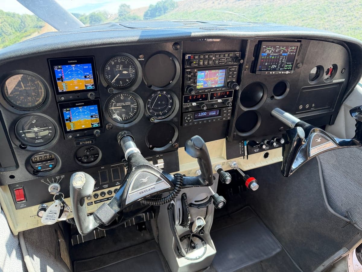 The cockpit of the Skylane aircraft features a full instrument panel.
