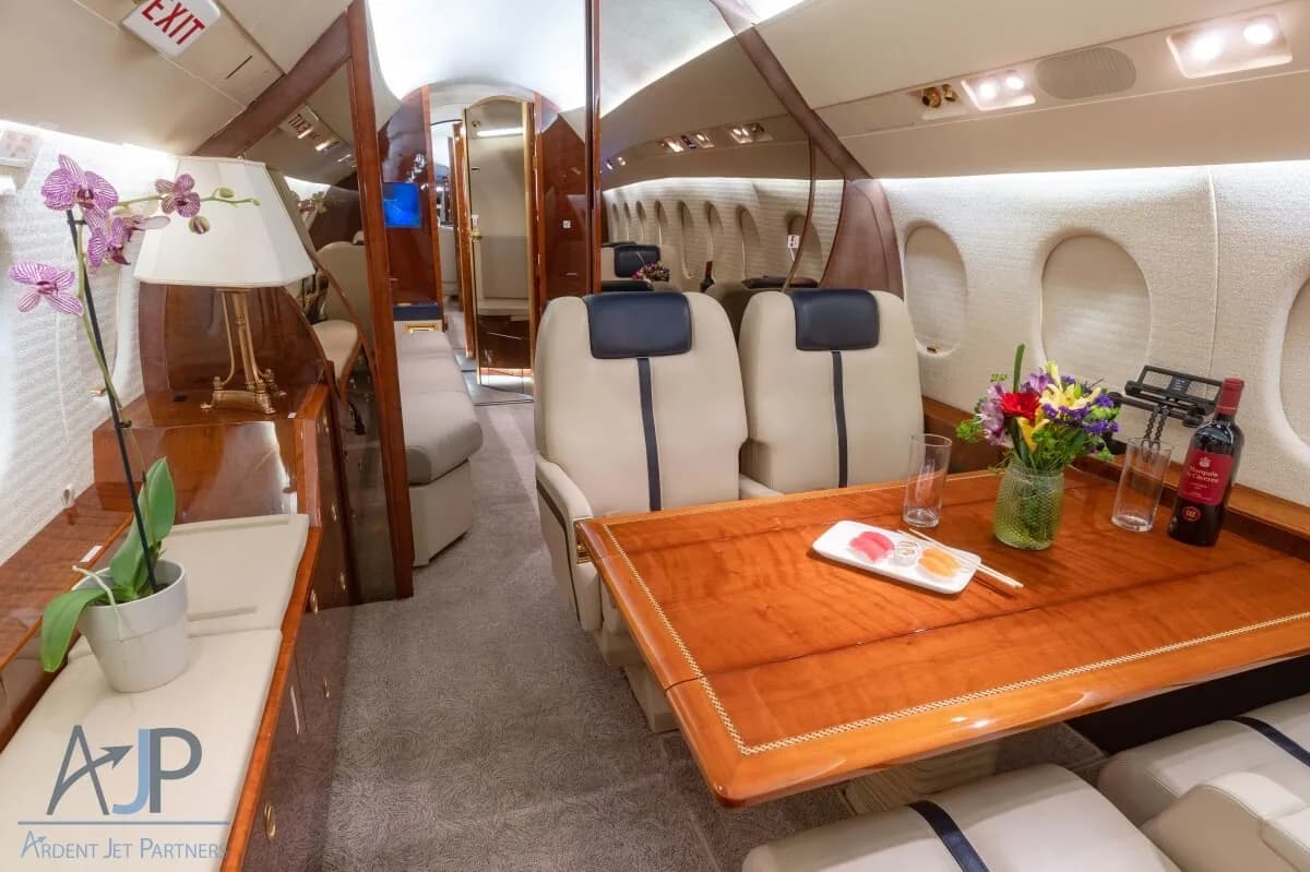 Cabin layout diagram for a jet, showing seating and amenities.