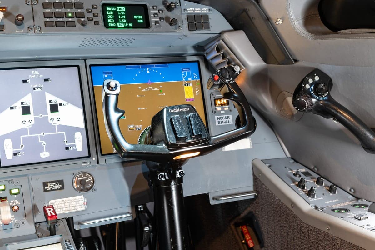 Close-up of the aircraft's control yoke and instrument panel.