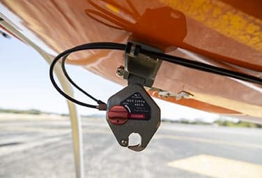 Close-up of a helicopter cargo hook mechanism.