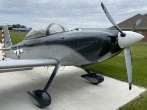 Close-up side view of the N194PT aircraft with a clear canopy.