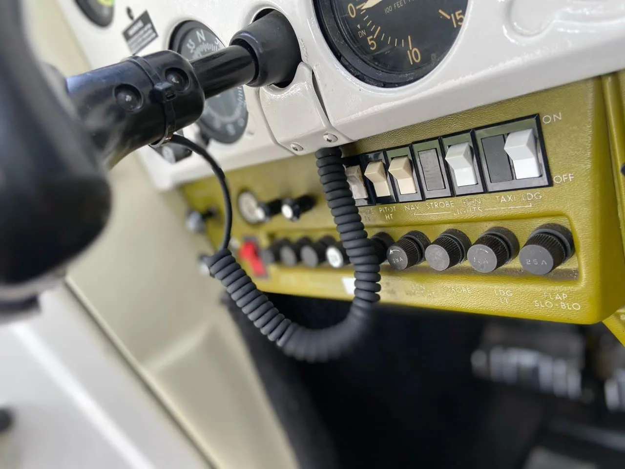 Close up of the Cessna 150 cockpit switches and dials.