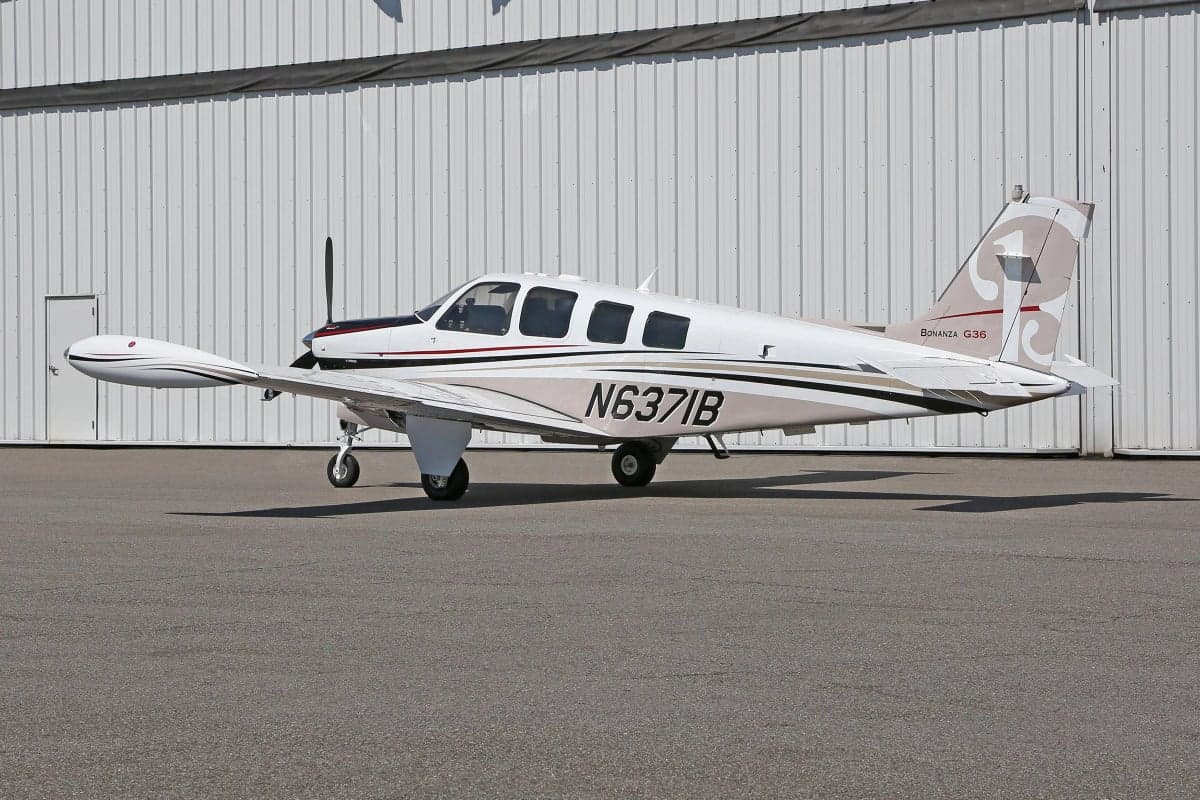 Side view of the Beechcraft Bonanza G36 aircraft with tail number N6371B.