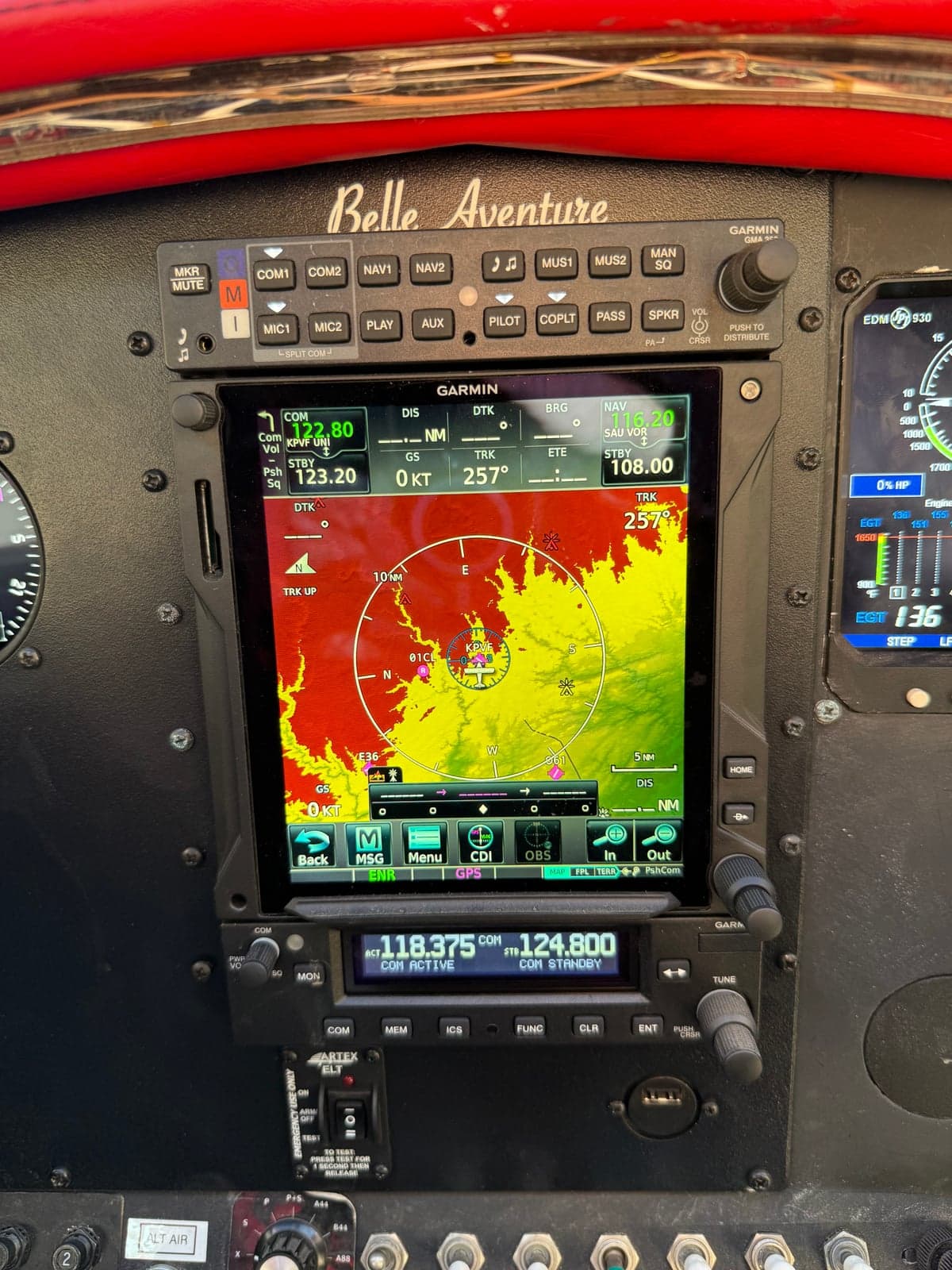 Close-up of the aircraft's Garmin avionics display showing a moving map.