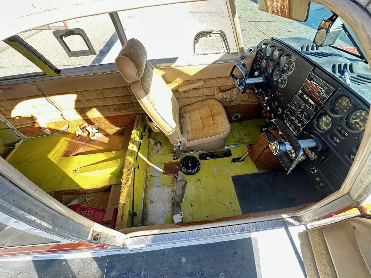View of the cockpit and front seats of the aircraft.