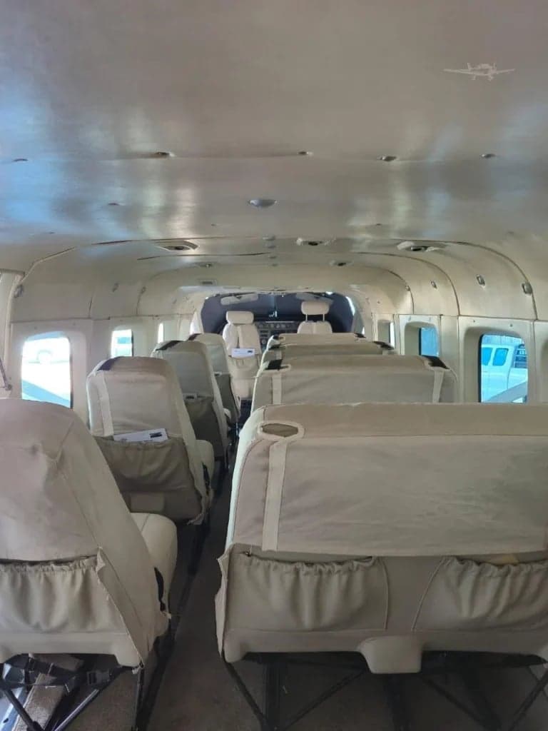 The interior cabin seats of the Cessna Caravan aircraft.