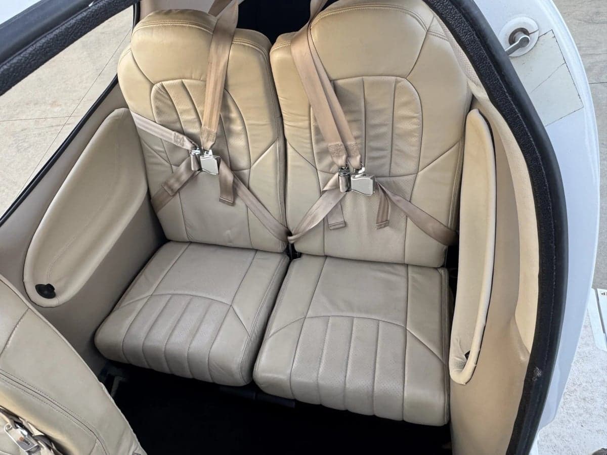 Close-up of the rear seats in a Cirrus SR20 aircraft.