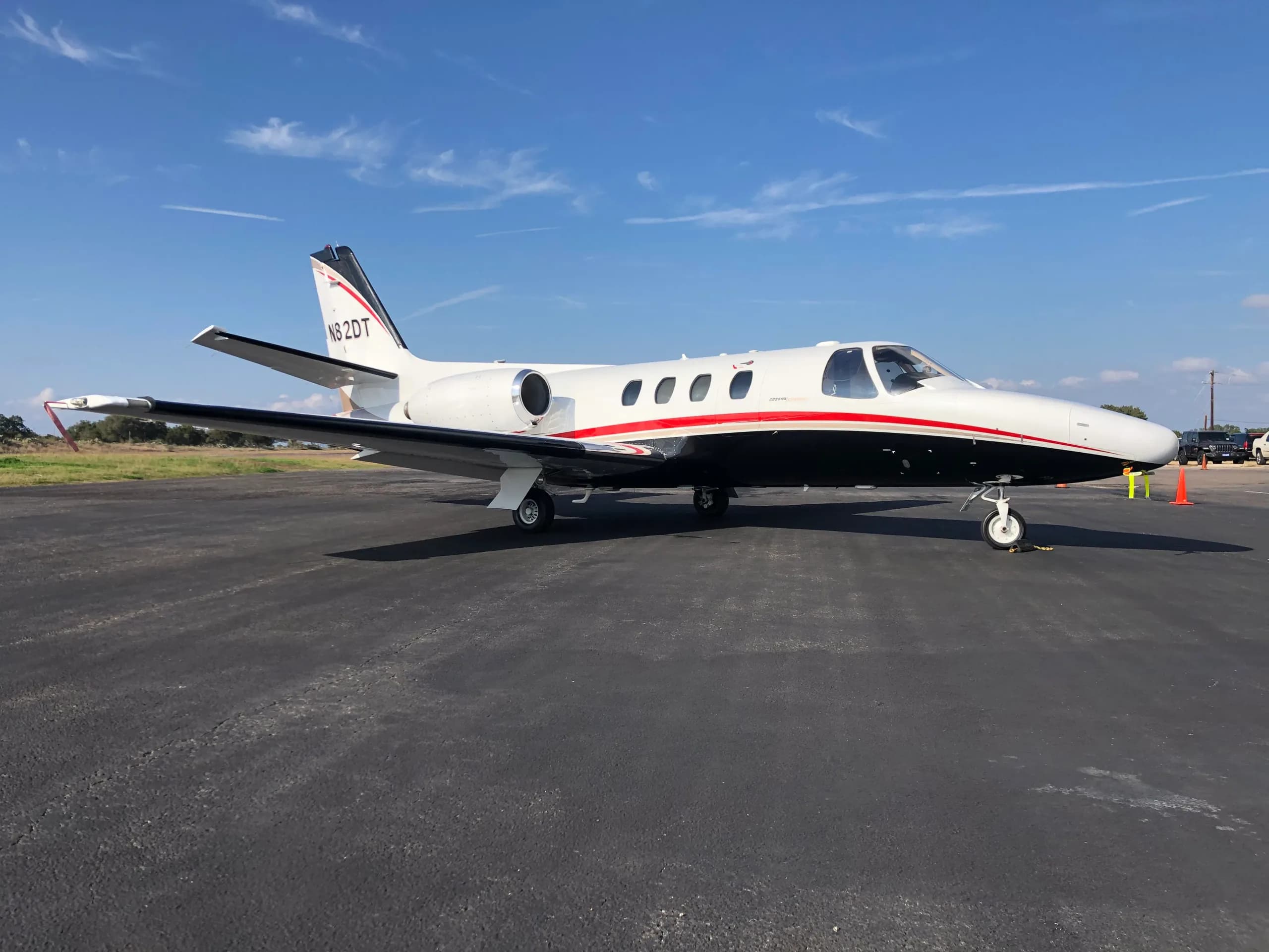 N82DT Cessna Citation on the tarmac with a black and white paint scheme.