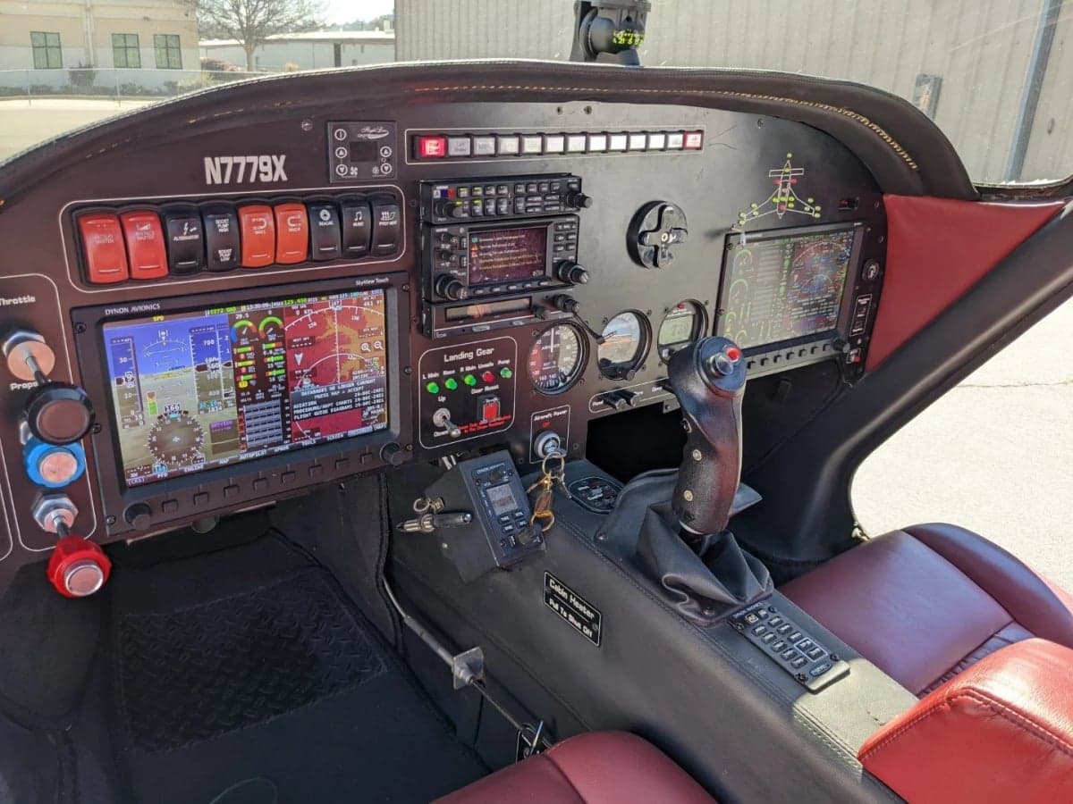 Detailed view of the N7779X aircraft cockpit instrument panel.