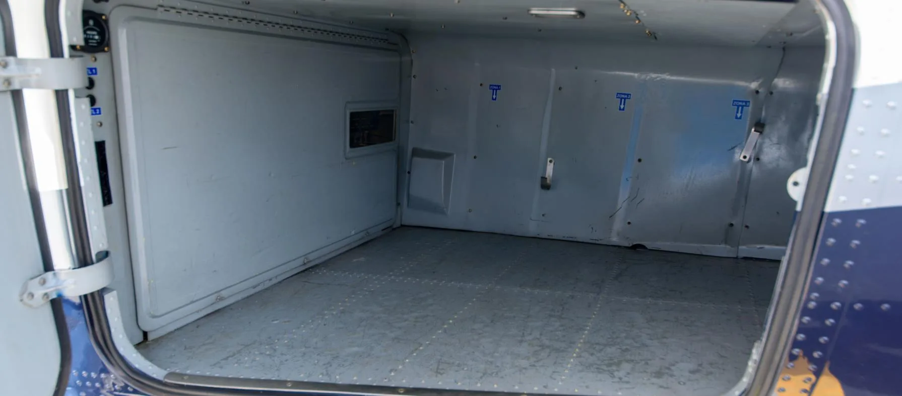 Empty cargo area of the helicopter.