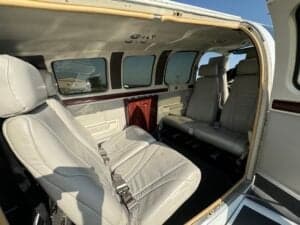 Interior view of the aircraft showing the cabin seats.