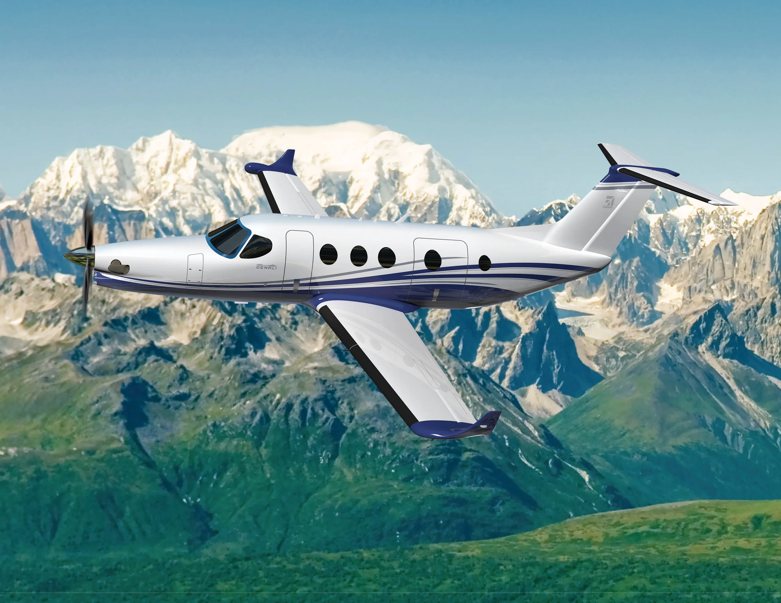 Pilatus PC-12 NGX flying over mountains.