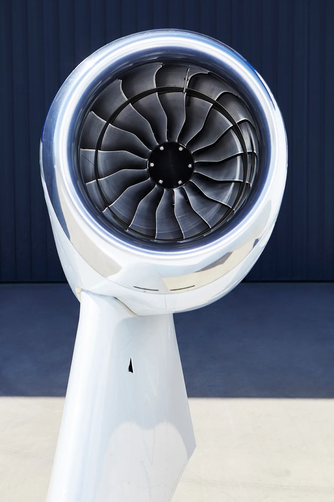 Close-up view of the engine nacelle and fan blades of a HondaJet.