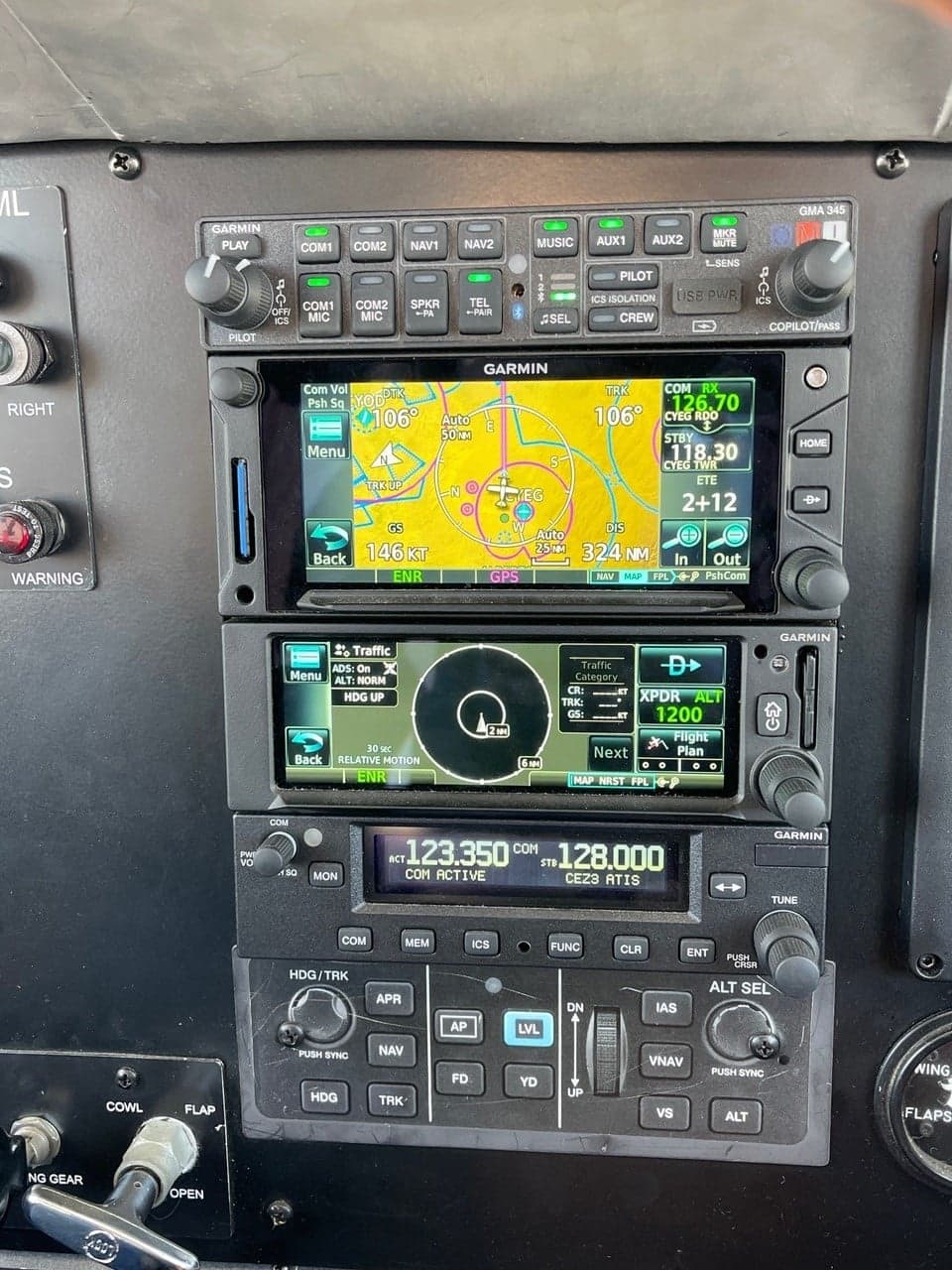 Close-up of the Garmin avionics stack in the cockpit.