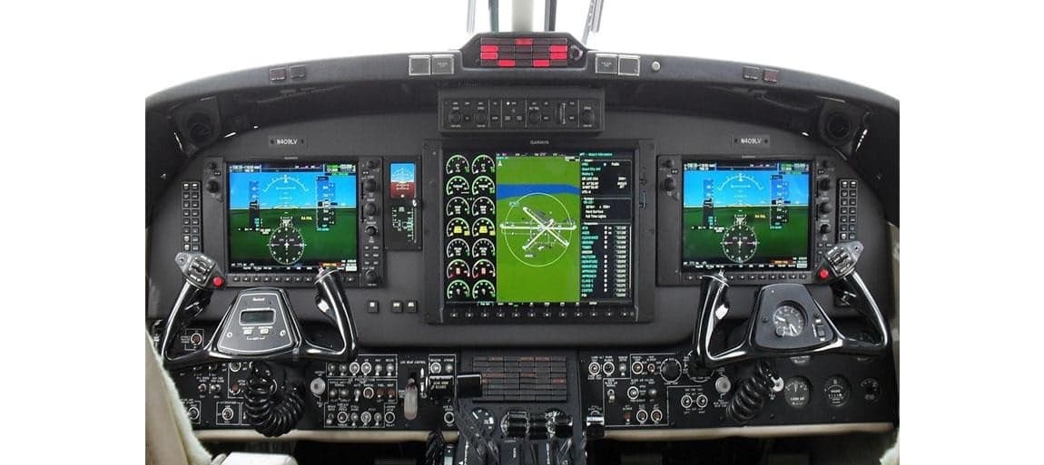 The cockpit features a modern glass panel display.