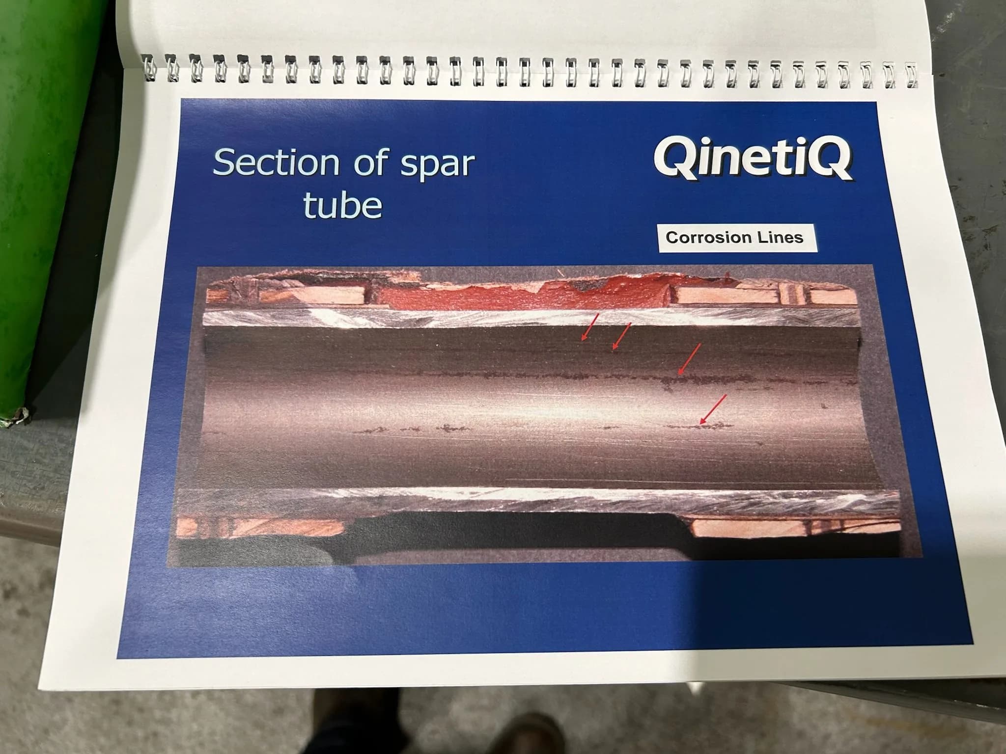 QinetiQ document showing a section of spar tube with corrosion lines.
