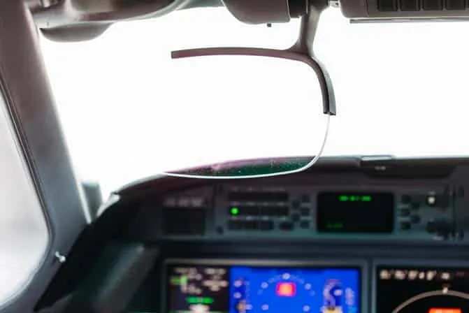 A close-up view of the head-up display (HUD) in the cockpit of a Gulfstream G550.