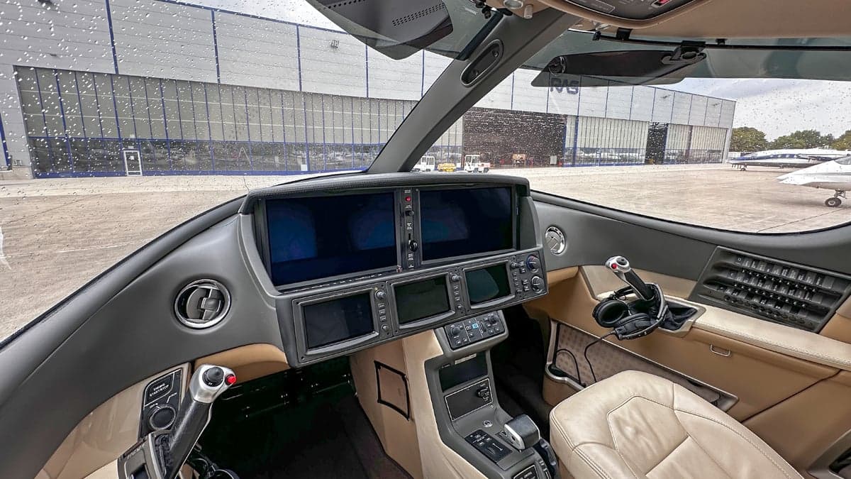 The cockpit of the Cirrus Vision Jet features a modern glass panel.