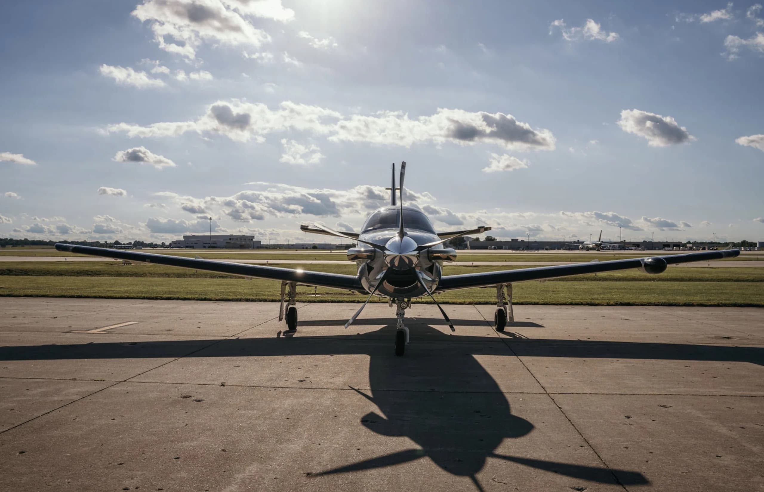 Front view of the N850VF aircraft on the tarmac under a sunny sky.